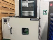 Figure 2. The Morehouse temperature chamber and switching rack. Thirty channels let us compensate a batch of cells in one run.
